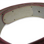 "Pink belt with heart-shaped buckle"