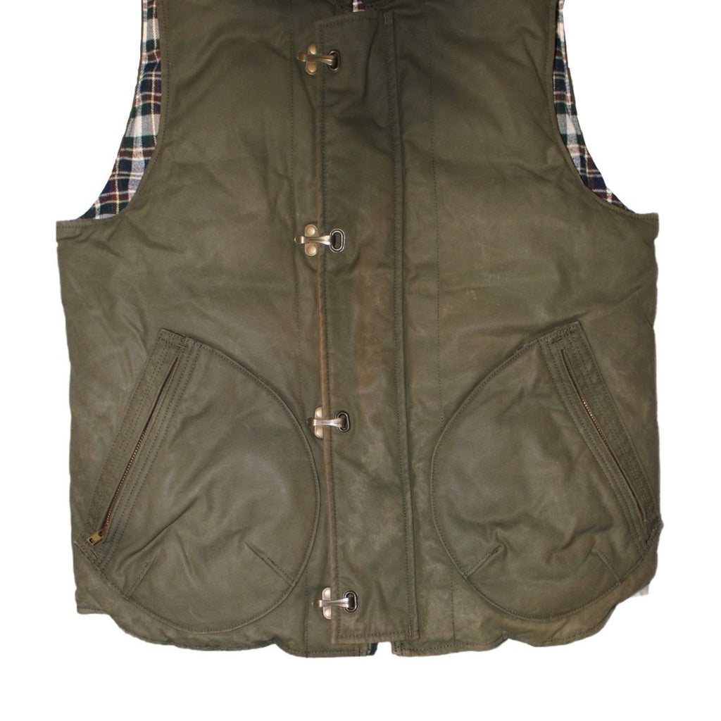 "Comme des Garçons Homme" Oiled cotton down vest